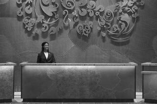 Front desk at The Westin Nashville – modern hotel reception with artistic wall design, friendly staff, and luxury service in downtown Nashville.